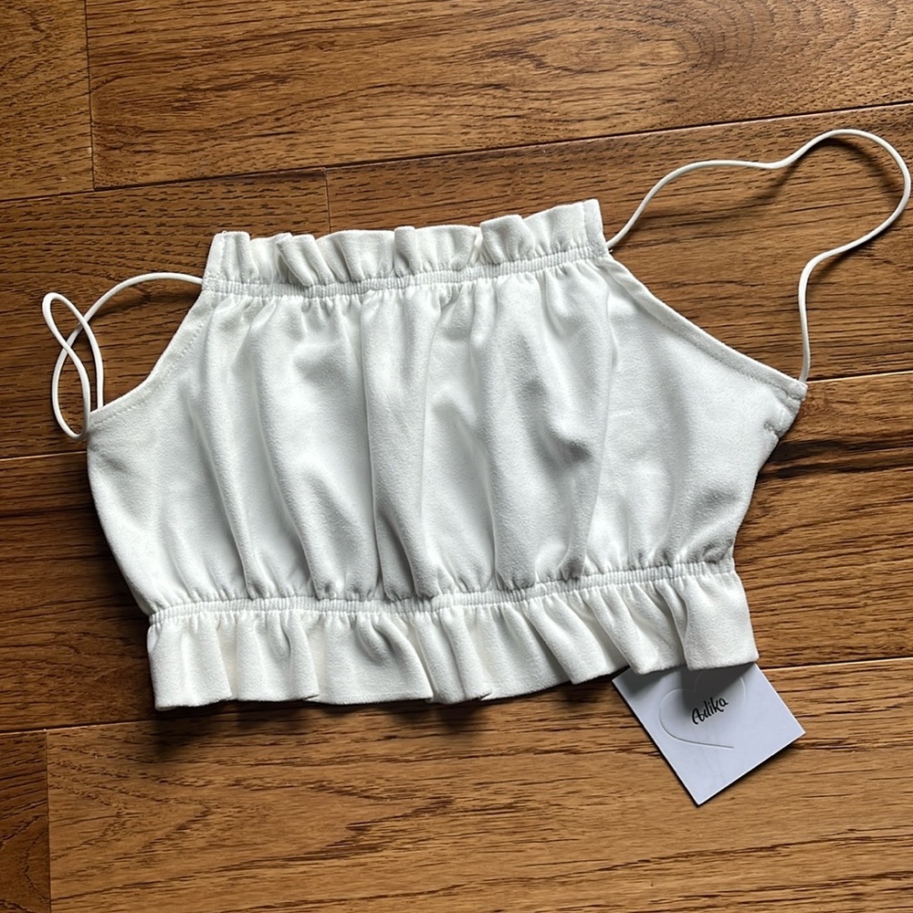 Adika size small faux suede white crop top open back NWT